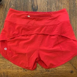 Red lululemon shorts, I'm around 5'8,full coverage